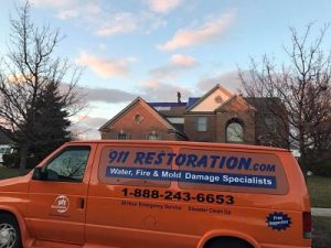 water damage restoration van ready at job site